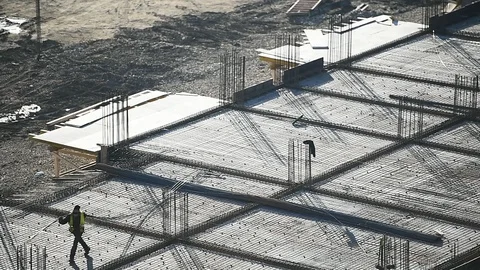 Team of construction workers preparing concrete slabs on a construction site 스톡 동영상 126580329