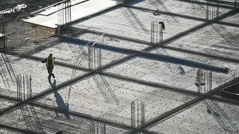 Team of construction workers preparing concrete slabs on a construction site 스톡 동영상 126580492