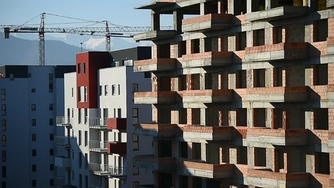 Team of construction workers preparing concrete slabs on a construction site 스톡 동영상 126580669
