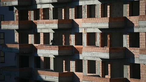 Team of construction workers preparing concrete slabs on a construction site 스톡 동영상 126580784