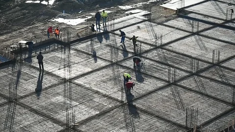 Team of construction workers preparing concrete slabs on a construction site 스톡 동영상 126580800