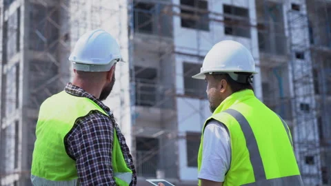Team of Construction workers Senior architect or civil engineer and foreman.. Stock Footage 262158025