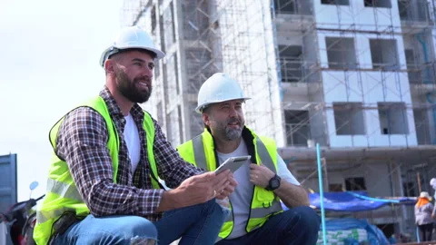Team of Construction workers Senior architect or civil engineer and foreman.. Stock Footage 262158147