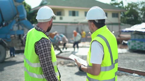 Team of Construction workers Senior architect or civil engineer and foreman.. Stock Footage 262159396