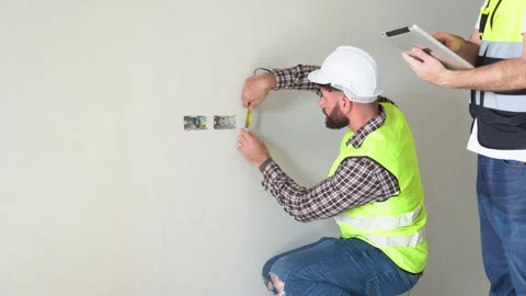 Team of Construction workers Senior architect or civil engineer and foreman.. Stock Footage 262161981