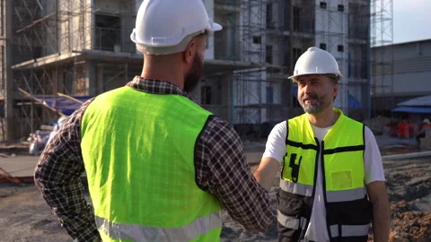 Team of Construction workers Senior architect or civil engineer and foreman.. Stock Footage 262162298