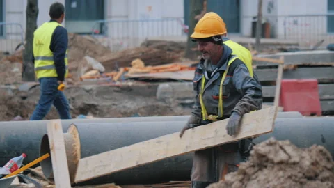 Team of Constructions Workers Working On A Construction Site. Stock Footage 158238484