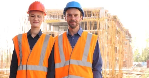 Team of Constructor Engineers Showing Thumbs Up Sign Under Construction Building Stock Footage 88007312