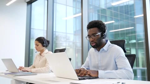 Team of corporate operators working in customer support service on helpline  Stock Footage 343620671