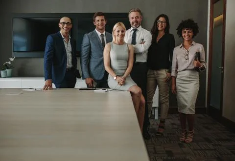 Team of corporate professionals in conference room Stock Photos