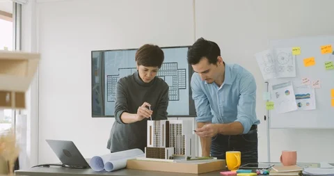 Team of creative architects working together in a architect studio. Video stock 91898034