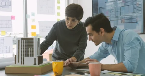 Team of creative architects working together in a architect studio. Stock Footage 91899661
