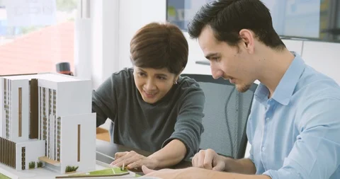 Team of creative architects working together in a architect studio. Stock Footage 91904619