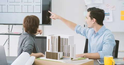 Team of creative architects working together in a architect studio. Stock Footage 91905413