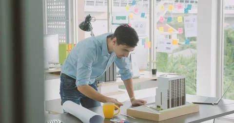 Team of creative architects working together in a architect studio. Stock Footage 91914781