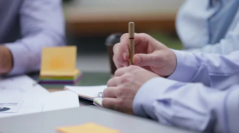 A team of creative employees working in the office Stock Footage 64114128