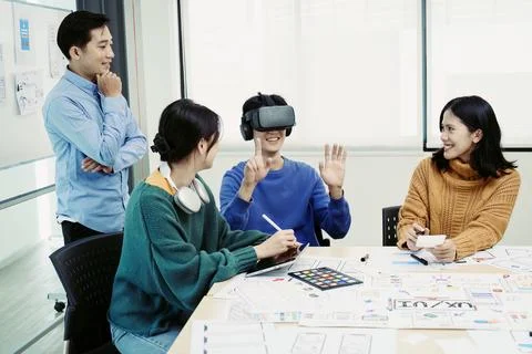 Team of Creative Web, Graphic Designer planning for mobile phone, drawing Stock Photos