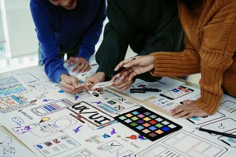 Team of Creative Web, Graphic Designer planning for mobile phone, drawing Stock Photos