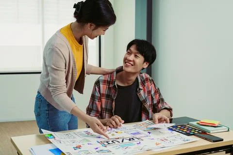 Team of Creative Web, Graphic Designer planning for mobile phone, drawing Stock Photos