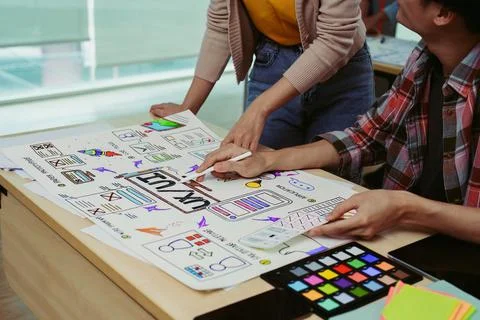 Team of Creative Web, Graphic Designer planning for mobile phone, drawing Stock Photos