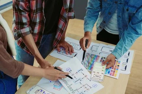 Team of Creative Web, Graphic Designer planning for mobile phone, drawing Stock Photos