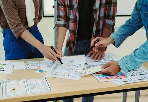 Team of Creative Web, Graphic Designer planning for mobile phone, drawing Stock Photos