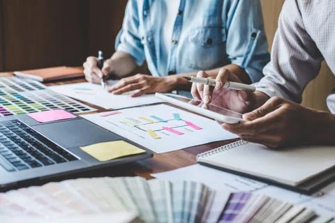 Team of Creative Web/Graphic Designer planning, drawing website ux app for mo Stock Photos