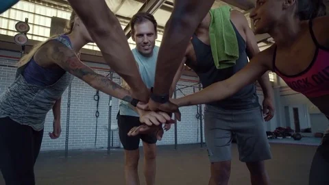 Team cuddle and group cheer in gym Video stock 71618215
