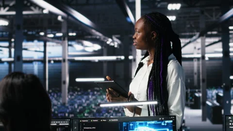 Team of data center developers doing brainstorming, monitoring neural network AI Stock Footage 313567044