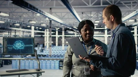 Team of data center engineers investigate neural networks configuration Stock Footage 314683113