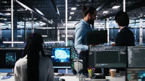 Team of data center engineers using machine learning algorithms Stock Footage 313568756