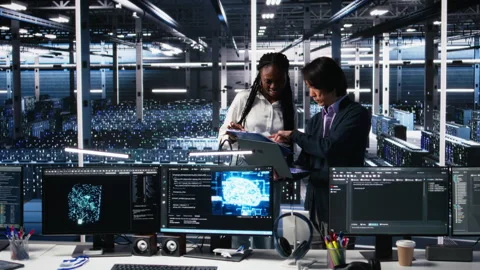 Team of data center engineers using machine learning algorithms Stock Footage 313639434