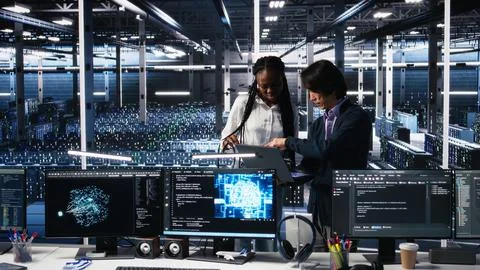 Team of data center engineers using machine learning algorithms 스톡 사진