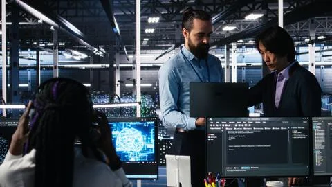 Team of data center engineers using machine learning algorithms 스톡 사진