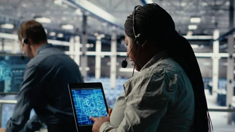 Team of data center programmers using AI to help customers Stock Footage 314686355