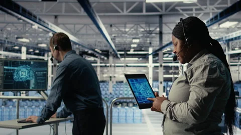 Team of data center programmers using AI to help customers Stock Footage 314805213