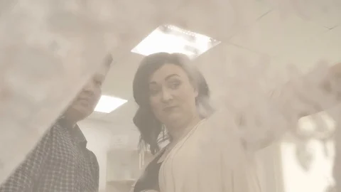 A team of designers creates clothes in the sewing studio Video stock 90513178