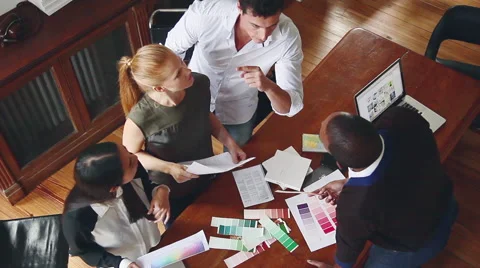Team of designers working together on project Stock Footage 63280660
