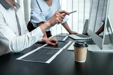 Team of Developer programmer working on coding program software computer in o Stock Photos