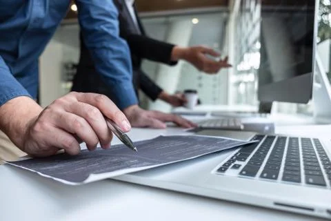 Team of developer programmer working on project in software development compu Stock Photos