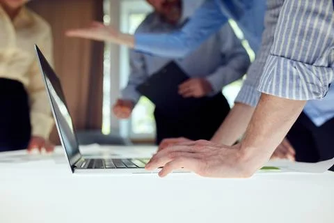 Team of developers creating new Website design, working on software over modern 库存照片