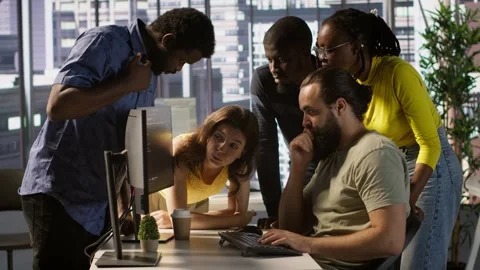 Team of developers doing brainstorming, optimizing code Stock Footage 318237176