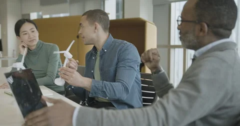 Team of Developers in a Meeting to Discuss Wind power Stock Footage 272894053