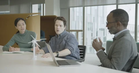 Team of Developers in a Meeting to Discuss Wind power Stock Footage 272894938