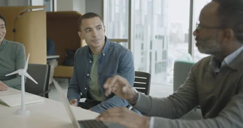 Team of Developers in a Meeting to Discuss Wind power Stock Footage 273211595