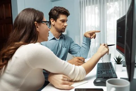 Team developers program thinking newest coding creative website. Postulate. Stockfoto's