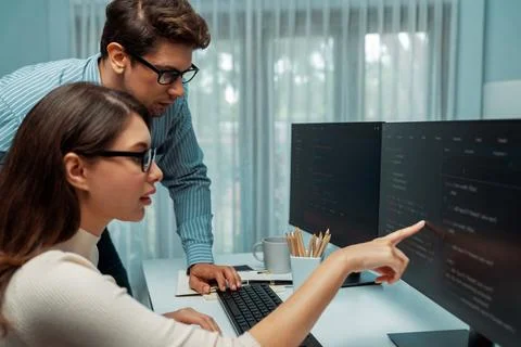 Team developers program thinking newest coding creative website. Postulate. Stock Photos