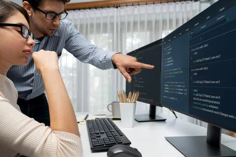 Team developers program thinking newest coding creative website. Postulate. Stock Fotos