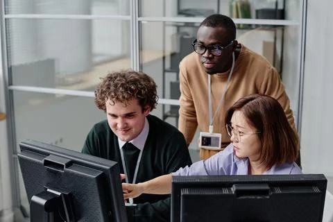 Team of developers working with codes Stockfoto's