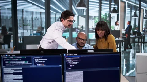 Team Developing Code On Desktop Stock Footage 331154055